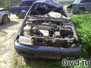 Битый автомобиль Toyota Carina E